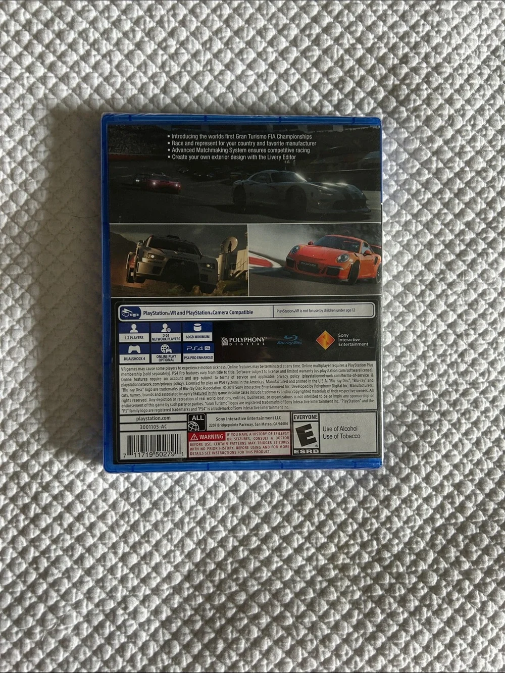 Sony PlayStation 4 Game Case with Red and Black Racing Artwork